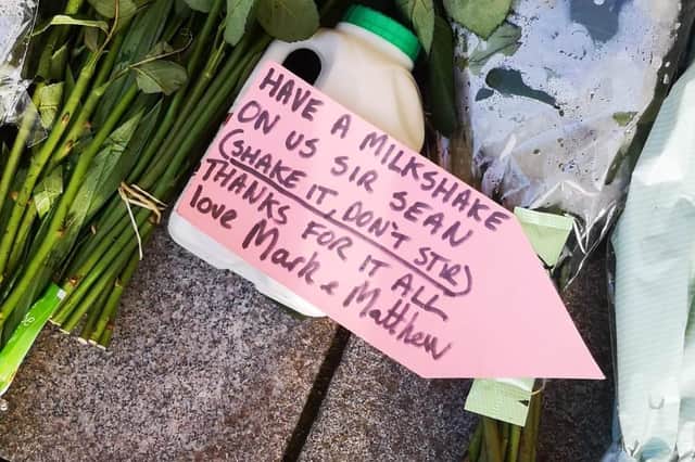 Fans pay their respects with a carton of milk.