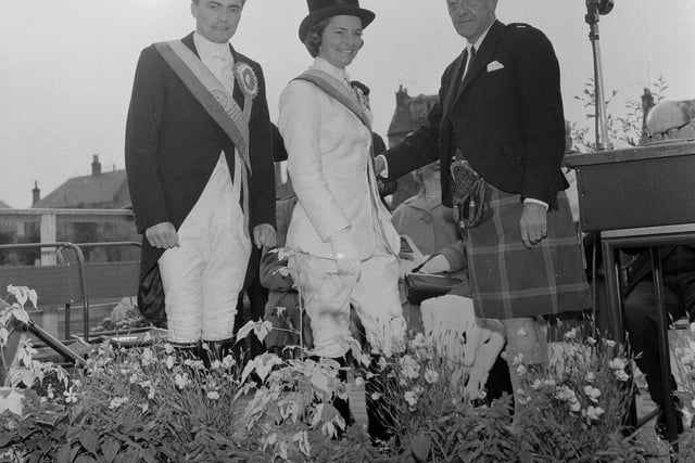 Brigadier Alasdair Maclean performing the Sashing ceremony with the Honest Lad and Lass during Musselburgh's Festival Week in 1965.