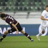 Hearts midfielder Peter Haring is wrong-footed by Zurich's Donis Avdijaj. Picture: AP