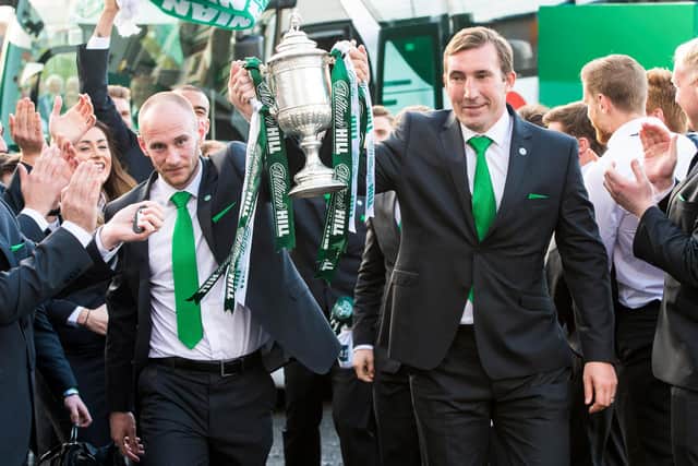 David Gray and former manager Alan Stubbs celebrate winning the Scottish Cup as they arrive back at Easter Road with the trophy in May, 2016. Photo by Ross Parker/SNS Group