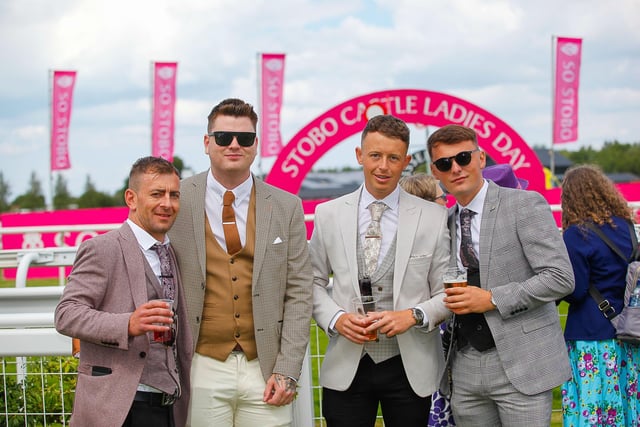 Four guests strike a pose at Musselburgh's Ladies Day event.