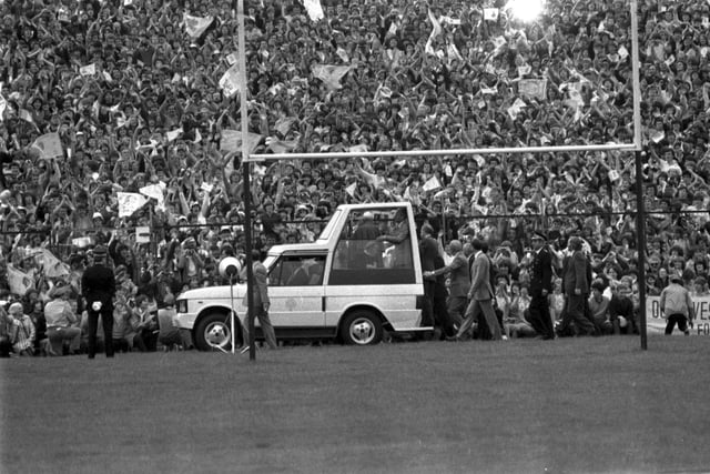 Pope John Paul II does a final circuit of Murrayfield in the Popemobile during the Papal visit to Scotland in May 1982. 