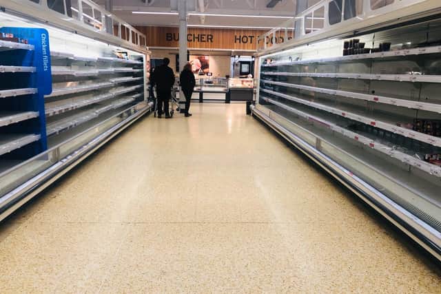 Empty shelves at Sainsbury's in Blackhall, Edinburgh. Panic buyers have stripped the supermarket shelves of food, soap and toilet rolls as fears rise over the spread of the Coronavirus