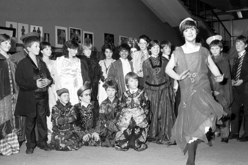 First Year history pupils from George Heriots school in Edinburgh, dressed in vintage clothing from the Royal Museum of Scotland in December 1985. One girl in a 1920s 'flapper' dress dances the Charleston.