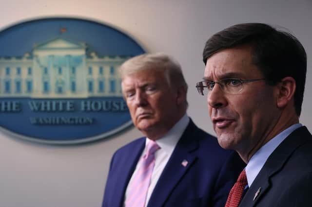 Mark Esper, right, who was sacked as Donald Trump's Defence Secretary, said: 'Who’s going to come in behind me? It’s going to be a real ‘yes man’. And then God help us.' (Picture: Win McNamee/Getty Images)