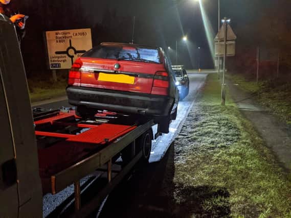 The recovery truck was stopped by the road policing officers last night near Whitburn (Photo: Road Policing Scotland).
