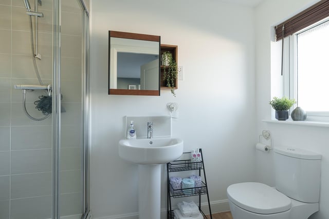 The other en-suite shower room. Further benefits include great storage throughout including a partially floored attic with Ramsay ladder, gas central heating and double glazing.