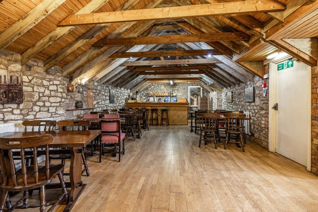 The rear steading building that has been developed into a large games room with its own separate bar and a store room.