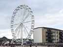 Operators of a Ferris wheel which has been erected at Portobello have expressed their anger at Edinburgh City Council and the Scottish Government after they were granted a licence to operate - before then being told they could not due to the fact it is classed as a funfair. (Credit: Lisa Fergson)