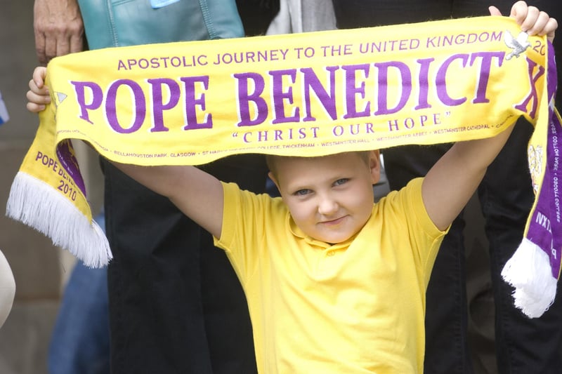 This young fan was there to wave his scarf as Pope Benedict XVI passed by on his progress along Princes Street.
