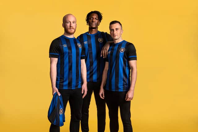 Hearts players Liam Boyce, Armand Gnanduillet and Aaron McEneff model the new third shirt. Pic: Heart of Midlothian FC.