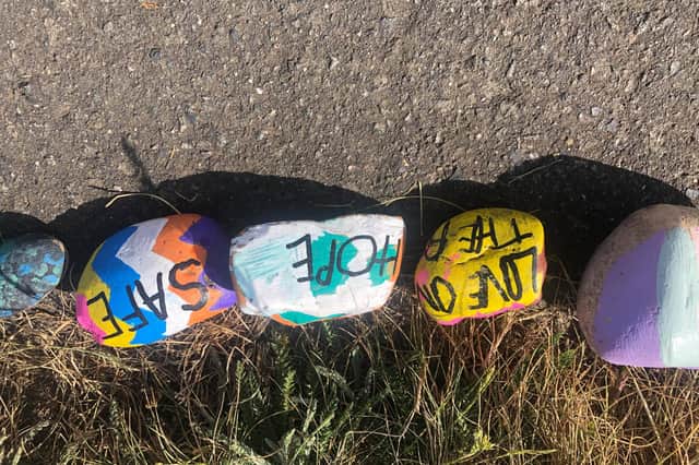 The rocks are painted by local residents