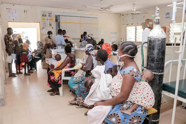 A queue of paediatric surgery patients awaits help.