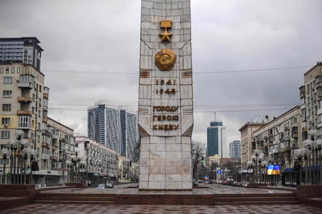This picture shows on the Obelisk of the hero city of Kyiv on Victory Square. The Russian President launched a full-scale invasion of Ukraine on February 24, 2022, killing dozens and forcing hundreds to flee for their lives in the pro-Western neighbour. (Photo by Daniel LEAL / AFP) (Photo by DANIEL LEAL/AFP via Getty Images)