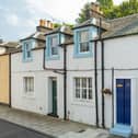 The one-bedroom cottage is tucked away on a cobbled mews just a short walk from the seafront at Wardie Bay.