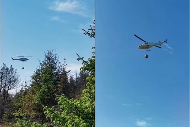 A helicopter was brought in to drop water from above. Pic: Les Mason/Twitter
