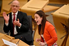 SNP leadership candidate Kate Forbes, applauded by her maternity leave stand-in as Finance Secretary, John Swinney (Picture: Jeff J Mitchell/Getty Images)