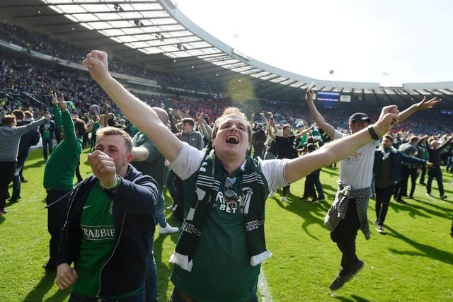 Hibs - fans on the pitch at full time. Pic Greg Macvean