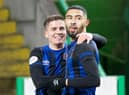 Josh Ginnelly celebrates with Cammy Devlin, two impressive performers in the first half, after scoring to put Hearts 1-0 up. Picture: Craig Williamson / SNS