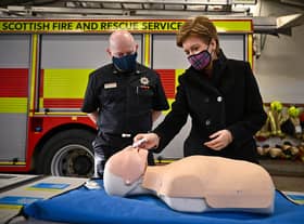 Nicola Sturgeon is shown how to administer naloxone at Bathgate Fire Station (Picture: Jeff J Mitchell-Pool/Getty Images)