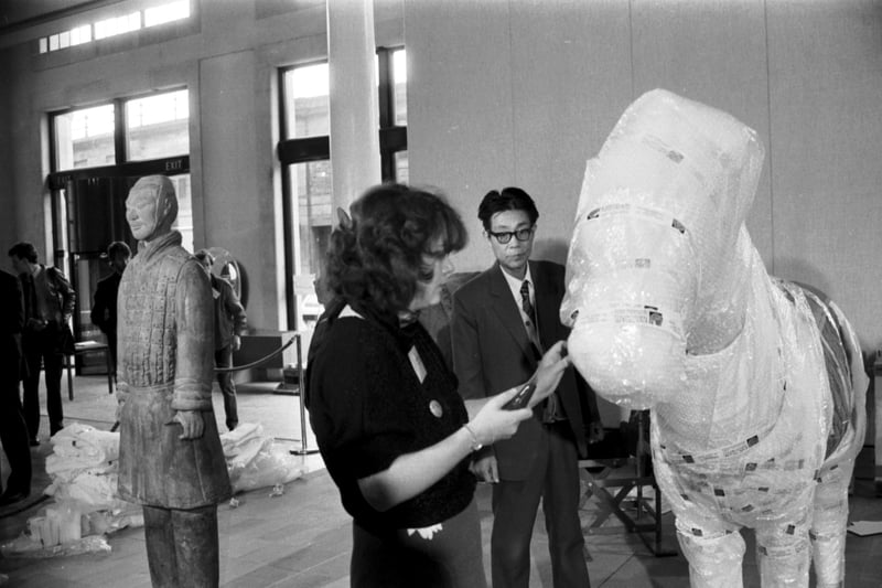 Yuan Zhong Yi was the Chinese archaeologist who excavated the Terracotta Army/Emperor's Warriors figures, which were found guarding the tomb of China's first emperor Shihuangdi. Mr Yi oversees a bubble-wrapped horse being opened at the City Arts Centre in Edinburgh in September 1985.