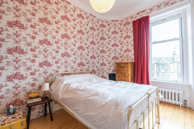 This flat has two bedrooms, both of which are spacious, with hard wood floors and natural light. This front facing room provides lovely views of the street outside and provides any prospective owner with the space to make themselves at home.