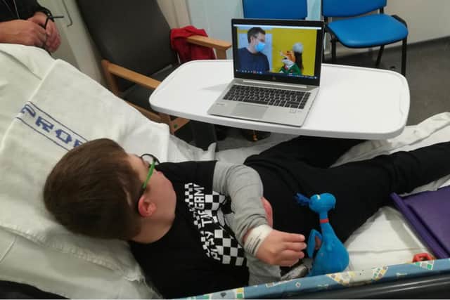 Connor Macdonald, age nine, has a sneak preview of the new video