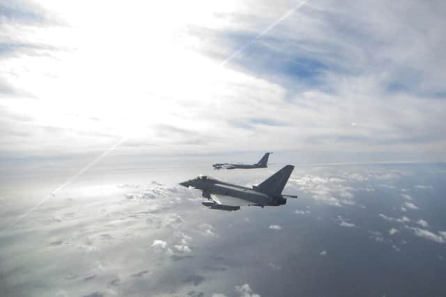 A Eurofighter Typhoon (near) and a Russian Bear F aircraft (far), one of two Russian aircraft the Typhoon was sent to intercept off the Scottish Coast from Leuchars Station.