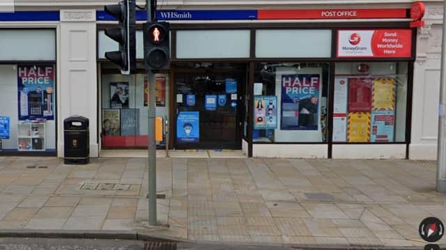 The  WHSmith store and post office in Dalkeith High Street