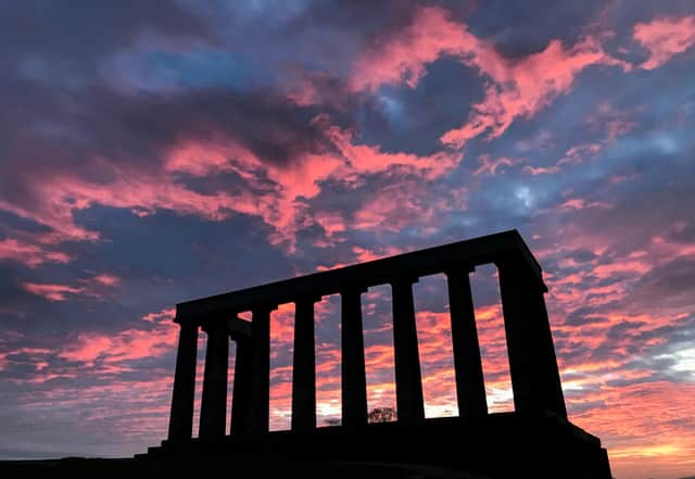 The sun rises behind the National Monument of Scotland on Edinburgh's Calton Hill (Picture: Jane Barlow/PA)