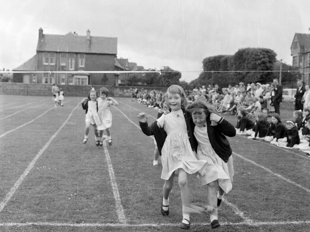 Fiona Brown and Alison Grant in the three legged race at the George Watson's Ladies College Preparatory School sportsday in June 1965.