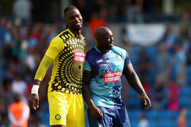 Yves Ma-Kalambay during his time at Wycombe Wanderers with his team-mate and friend Adebayo Akinfenwa. Picture: Getty