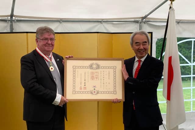 Professor Ian Gow (left) was awarded the Order of the Rising Sun at a ceremony earlier this month.