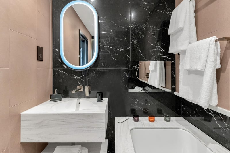 To continue the blush pink theme into the bathroom, the Bonnie Suite has a heated bathroom floor, a power shower, a de-mist mirror and a bath with a TV.
