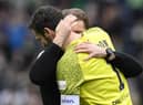 Craig Gordon and manager Robbie Neilson embrace at full time