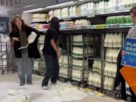 Animal Rebellion protesters poured milk on the floor at an Edinburgh Waitrose