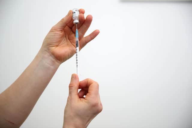 File photo dated 19/02/21 of a vial of the Pfizer-BioNTech coronavirus vaccine prepared for injection. Picture: Nick Potts/PA Wire