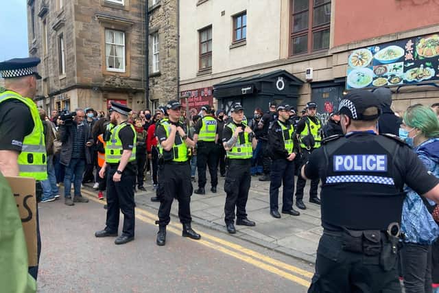 Police immigration officers were met by a huge crowd of protesters on Edinburgh's Southside when they attempted to remove some people from a nearby restaurant. The staff from the Beirut restaurant were 'de-arrested' according to people on the scene