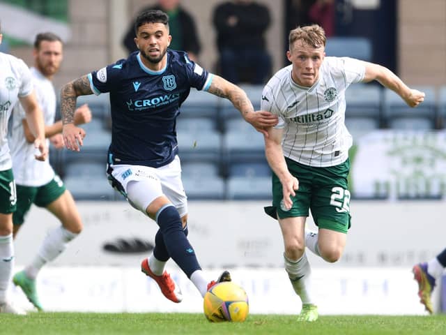 Jake Doyle-Hayes looks to get away from Dundee's Declan McDaid during the 2-2 draw at Dens Park