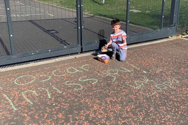 Oscar viewing a message left for him by a friend in Glasgow.