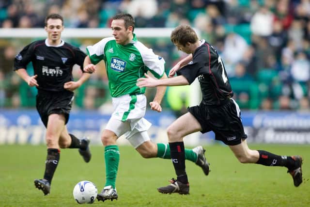 David Murphy embarks on one of his trademark surging runs in an SPL clash against Dunfermline in 2006