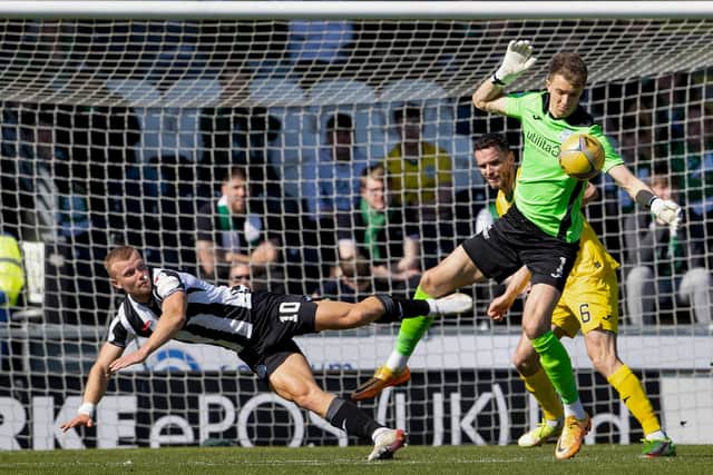 Hibs keeper Matt Macey comes for a late cross during his side's win over St Mirren. Picture: SNS