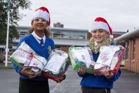 Ireen Opara and Elliot Hosey both from P7 have built up a very positive relationship with the local residents in Brookwell Court Sheltered Housing in Muirhouse over the past couple of years. At this time of year, they usually visit with the Christmas Choir, but due to current restrictions they are not able to do this - so are delivering Christmas hampers



 



So, our P7s have made Christmas Gift Parcels to give to all the residents this year.  They include 2 tins of soup, a tin of beans, a knitted hat and scarf, a shower gel, a small selection box, a homemade tealight and a Christmas card. The class will deliver them before the end of term, and they will be quarantined before being given to the residents. We are delighted to be able to do this and maintain contact with the residents during these challenging times.