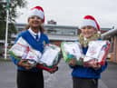 Ireen Opara and Elliot Hosey both from P7 have built up a very positive relationship with the local residents in Brookwell Court Sheltered Housing in Muirhouse over the past couple of years. At this time of year, they usually visit with the Christmas Choir, but due to current restrictions they are not able to do this - so are delivering Christmas hampers



 



So, our P7s have made Christmas Gift Parcels to give to all the residents this year.  They include 2 tins of soup, a tin of beans, a knitted hat and scarf, a shower gel, a small selection box, a homemade tealight and a Christmas card. The class will deliver them before the end of term, and they will be quarantined before being given to the residents. We are delighted to be able to do this and maintain contact with the residents during these challenging times.