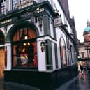 On the corner of the top of the Mound where the street meets the Royal Mile is Deacon Brodie's tavern, named after the crooked councillor himself. The original Brodie family lived on Brodie's Close on the opposite side of the Lawnmarket.