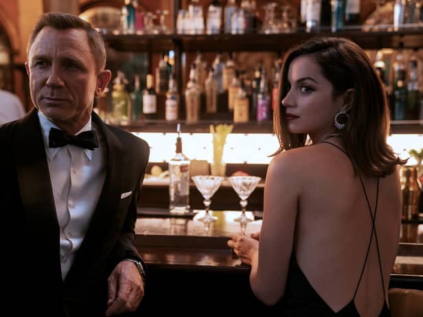 Daniel Craig playing James Bond and Ana de Armas as Paloma in the new Bond film No Time To Die.