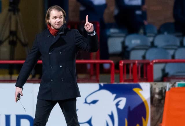 Robbie Neilson watched his Hearts team lose a second league game of the season at Dens Park.