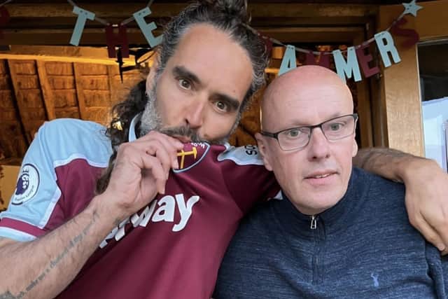 Russell Brand, left, with Hibs director of football Brian McDermott