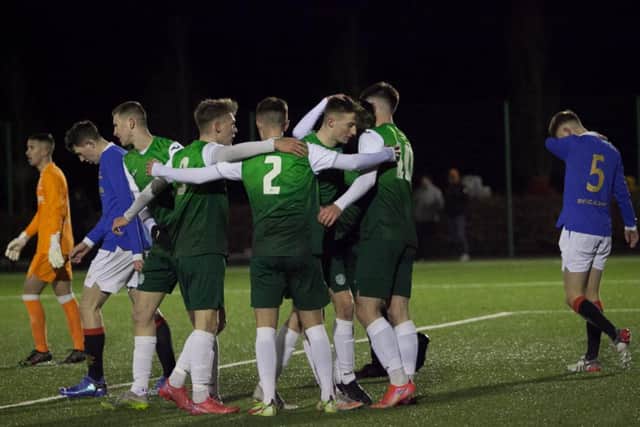 Hibs Under-18s celebrate a goal against Rangers during a league match. Picture: Maurice Dougan