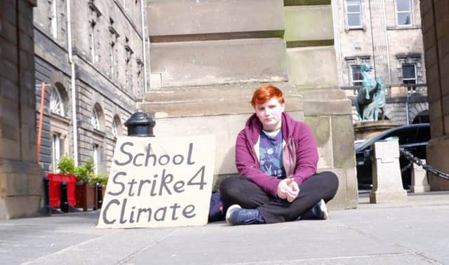 ‘I’m very determined and stubborn’: West Lothian pupil Dylan Hamilton starts a week-long climate protest.
